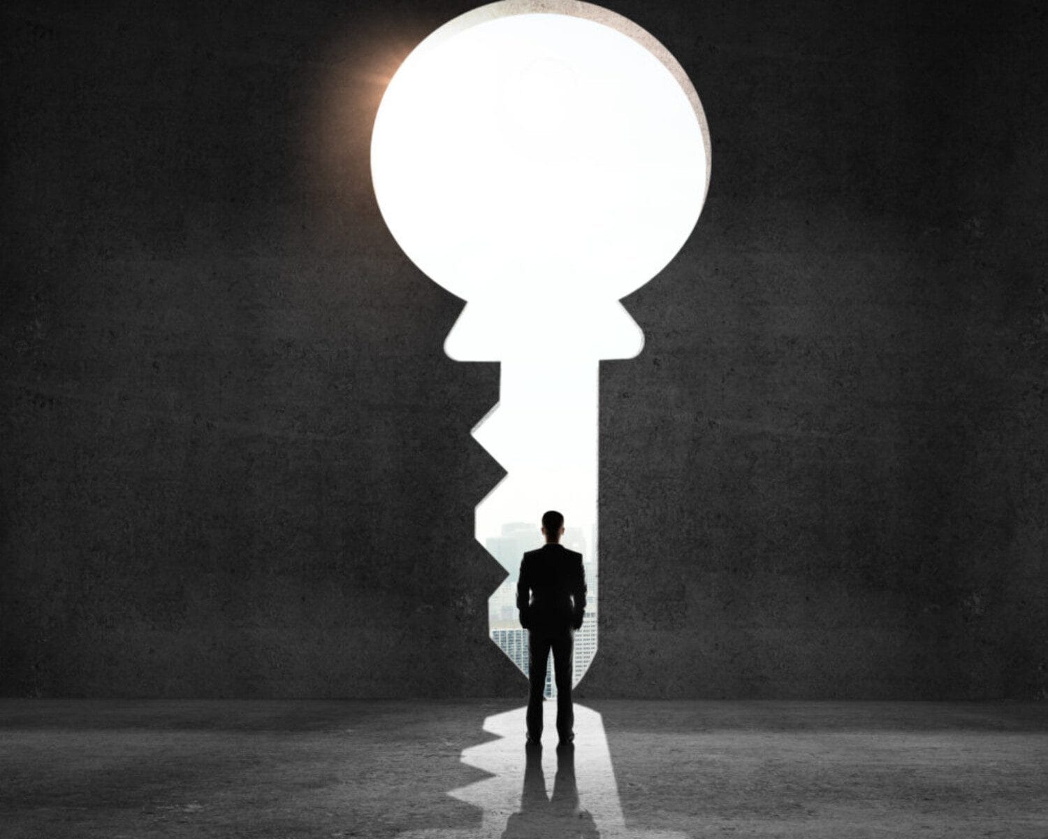 businessman looking an big key and drawing concept